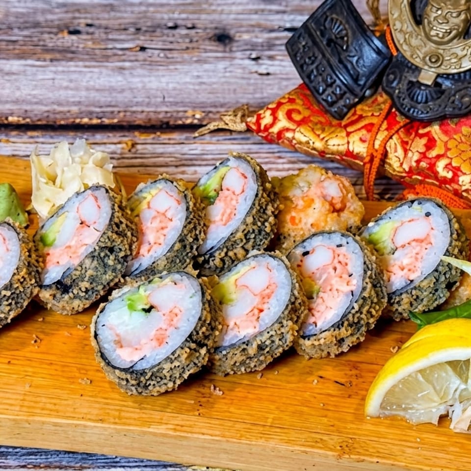 Crispy fried sushi rolls with shrimp and avocado, served with wasabi, ginger, and lemon.
